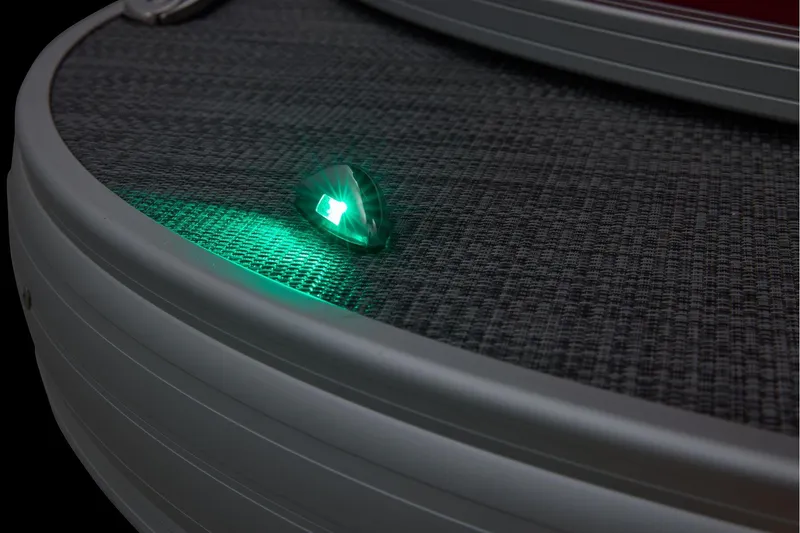 Slide: The Image of Manufacturer Provided Image: 2026 Sun Tracker Party Barge 18 DLX with illuminated green navigation light. - 29