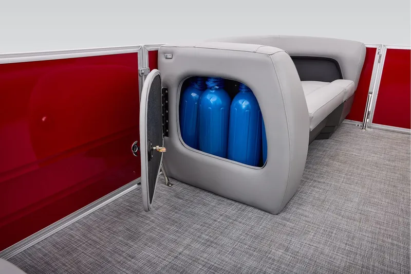 Slide: The Image of Manufacturer Provided Image: Sun Tracker Party Barge 18 DLX 2026 interior with storage compartment and blue tanks. - 37