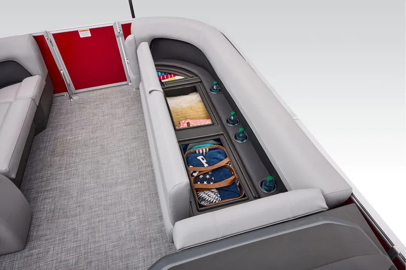 Slide: The Image of Manufacturer Provided Image: 2026 Sun Tracker Party Barge 18 DLX interior storage with seating and drink holders. - 38