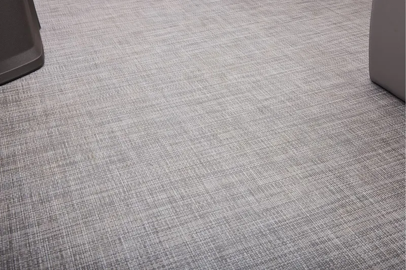 Slide: The Image of Manufacturer Provided Image: Gray woven flooring on 2026 Sun Tracker Party Barge 18 DLX pontoon boat. - 57