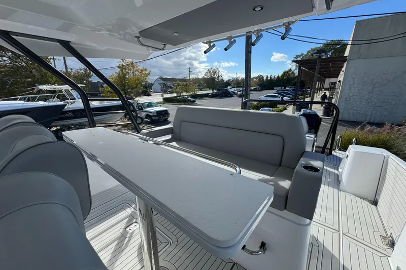 Slide: The Image of Interior of 2026 Cruisers Yachts 38 VTR with cozy seating and modern design. - 16