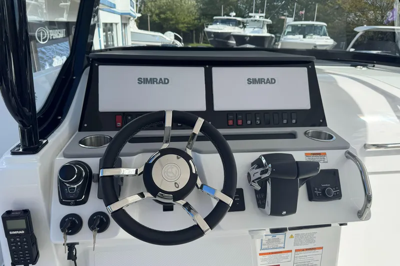 Slide: The Image of 2026 Cruisers Yachts 38 VTR boat with spacious seating on calm waters. - 18