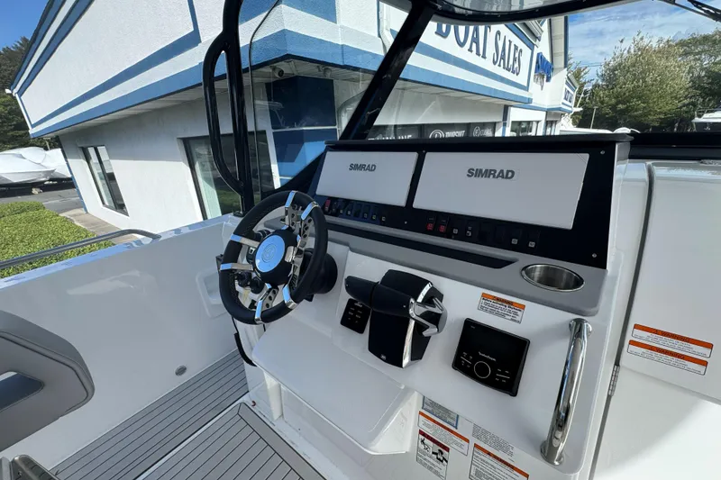 Slide: The Image of 2026 Cruisers Yachts 38 VTR on open water, clear sky, scenic view. - 19