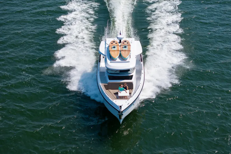 Slide: The Image of 2026 Cruisers Yachts 38 VTR interior with seating and cup holders, showcasing modern design. - 10