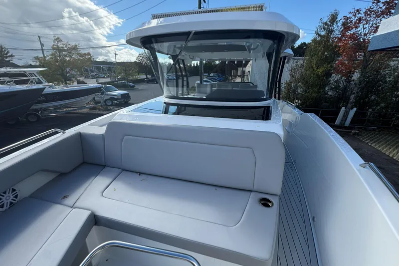 Slide: The Image of 2026 Cruisers Yachts 38 VTR boat with sleek design and spacious seating area. - 26