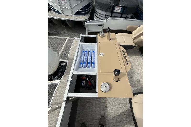 Slide: The Image of 2026 Berkshire 24RFC2 CTS 2.75 pontoon boat with storage and seating area. - 13