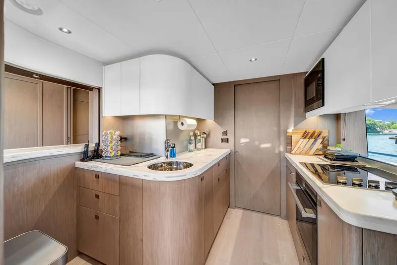 Slide: The Image of Luxurious kitchen interior of 2021 Sunseeker 86 Yacht with modern appliances and sleek design. - 21