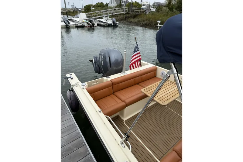 Slide: The Image of Yamaha tachometer on 2015 Rossiter 23 boat dashboard, displaying 324.5 hours. - 20