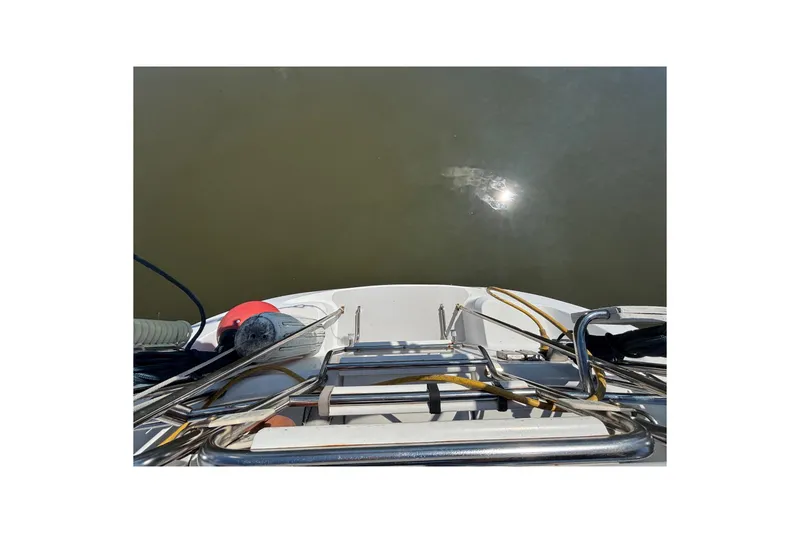 Slide: The Image of Top view of 2006 Catalina 320 boat deck with water reflection. - 12