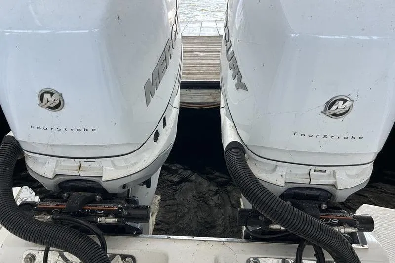 Slide: The Image of Twin Mercury FourStroke outboard engines on a 2022 Cobalt 30SC boat. - 3