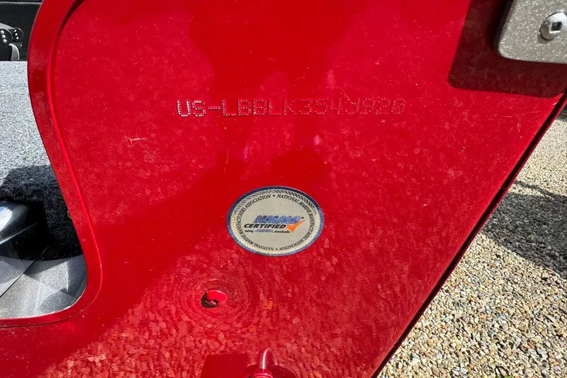 Slide: The Image of Red 2020 Lund 1675 Adventure Sport boat with certification sticker and serial number. - 19