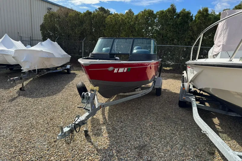 Slide: The Image of 2020 Lund 1675 Adventure Sport boat on trailer, parked outdoors. - 4