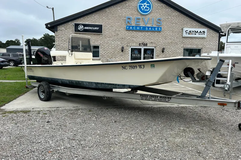 Slide: The Image of 2000 Jones Brothers 22 Bateau boat on trailer at Revis Yacht Sales. - 0