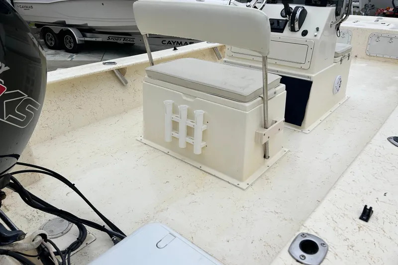 Slide: The Image of 2000 Jones Brothers 22 Bateau boat interior with seating and console. - 14