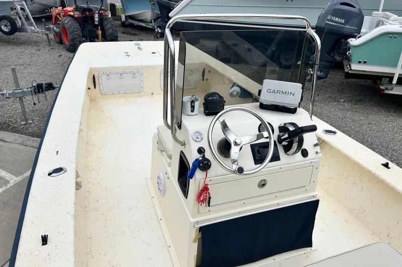 Slide: The Image of 2000 Jones Brothers 22 Bateau boat with Garmin navigation system and steering console. - 16