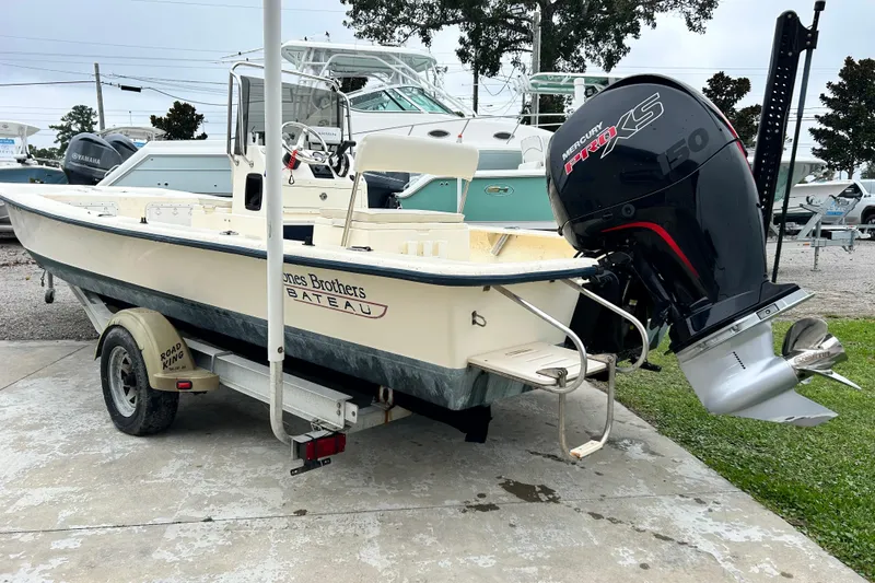 Slide: The Image of Jones Brothers 22 Bateau boat, 2000 model, on trailer with Mercury Pro XS engine. - 4