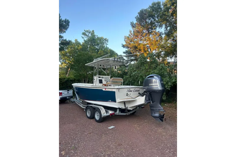 Slide: The Image of Ceiling speakers and lights on a 2023 Custom Dominion 23 boat. - 8