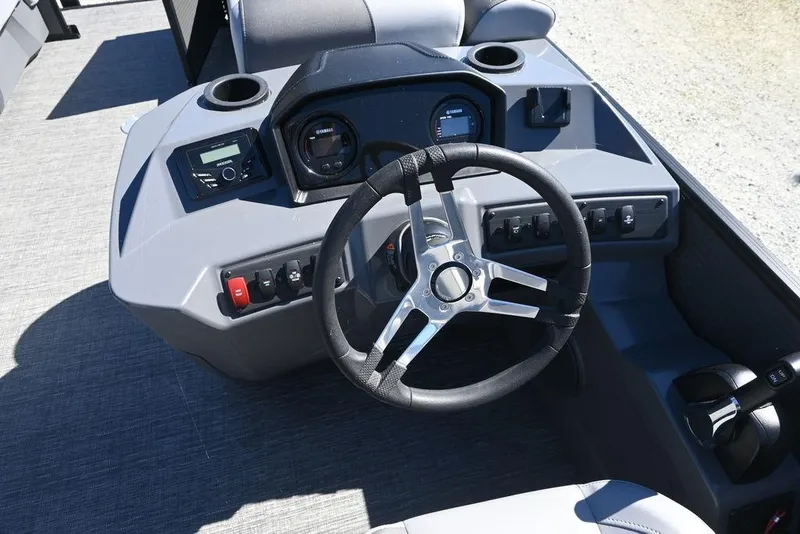Slide: The Image of Steering console of 2025 Bennington S 20 SSR boat with modern controls and gauges. - 10