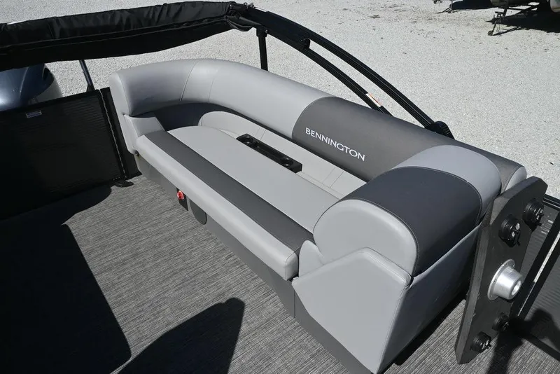 Slide: The Image of 2025 Bennington S 20 SSR boat interior with gray seating and sleek design. - 11