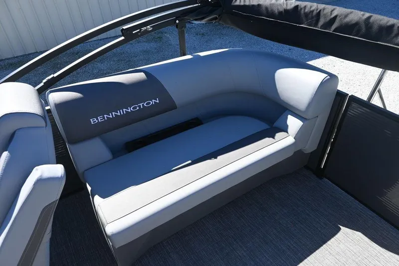 Slide: The Image of 2025 Bennington S 20 SSR boat interior with gray seating and logo. - 7