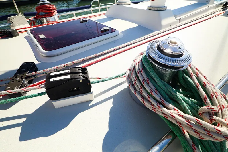 Slide: The Image of Deck of 2002 J Boats J/46 with winch and ropes in sunlight. - 12