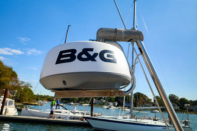 Slide: The Image of B&G radar on a 2002 J Boats J/46 sailboat, docked in a sunny marina. - 14