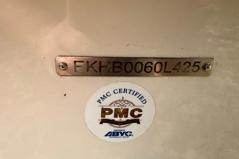 Slide: The Image of 2025 Carolina Skiff E21 DLX Kit with PMC certification and serial number plate. - 18