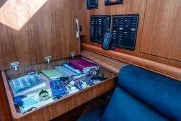 Slide: The Image of 2003 Hunter 356 yacht interior with navigation station and control panels. - 12