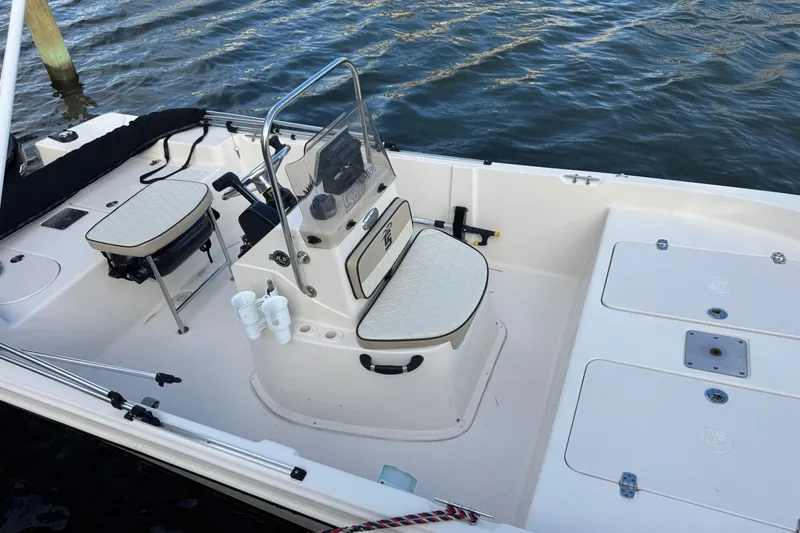 Slide: The Image of 2023 Carolina Skiff 16 JVX CC boat interior with seating and steering console. - 6