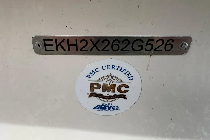 Slide: The Image of 2026 Carolina Skiff 19 LS with PMC certification and ABYC member sticker. - 19