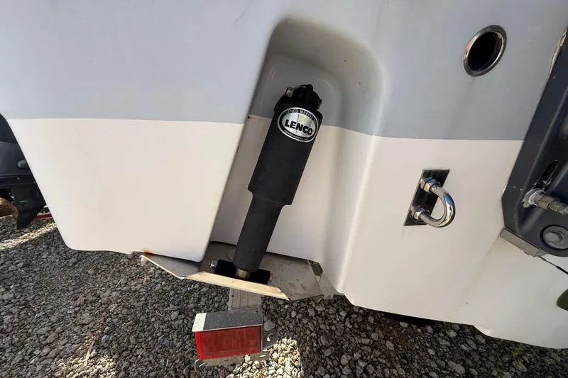 Slide: The Image of 2019 Robalo R242 Center Console boat with Lenco trim tab actuator. - 22