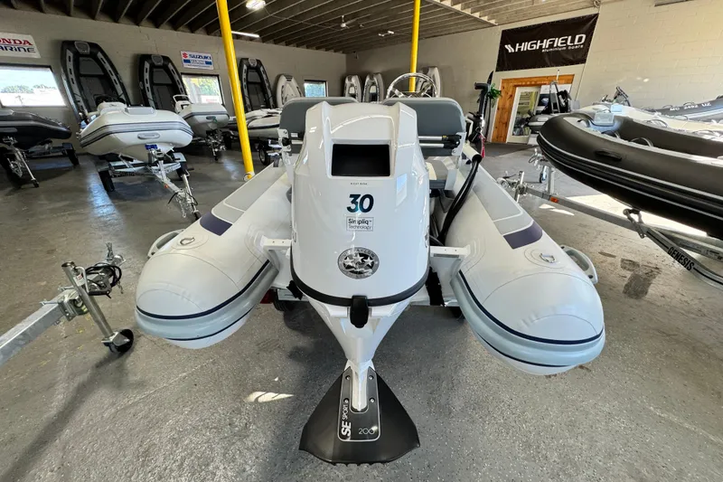 Slide: The Image of 2026 Highfield Classic 360 FCT inflatable boat displayed in a showroom. - 5