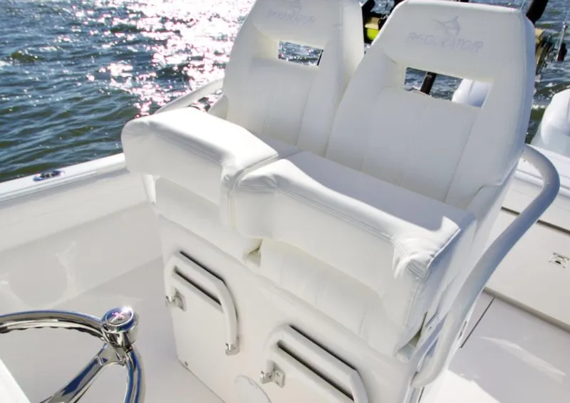 Slide: The Image of 2026 Regulator 25 boat interior with toilet and control panel. - 6