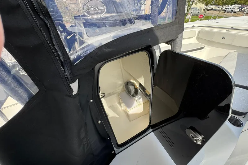 Slide: The Image of 2025 Sea Pro 222 Center Console boat interior with cushioned seating. - 22