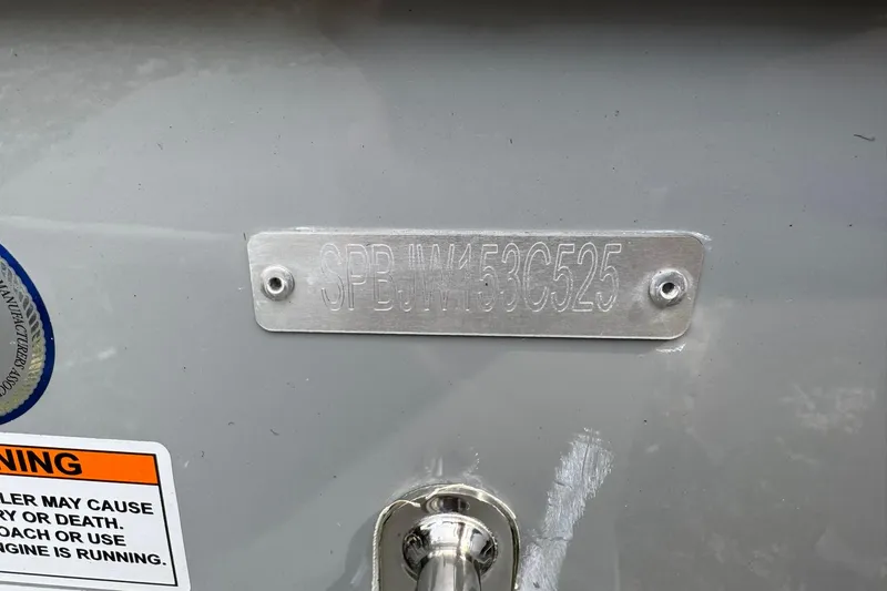 Slide: The Image of 2025 Sea Pro 222 Center Console boat identification plate with warning label. - 33