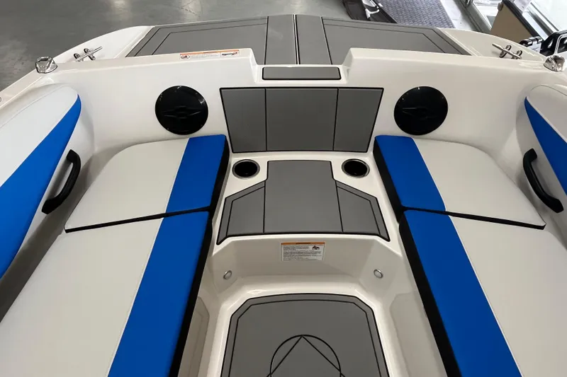 Slide: The Image of 2026 Starcraft SV 16 OB boat interior with blue and gray seating and cup holders. - 14