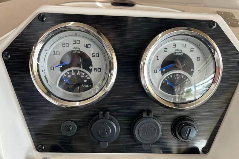 Slide: The Image of Dashboard of 2026 Starcraft SV 16 OB boat with speedometer and tachometer. - 26