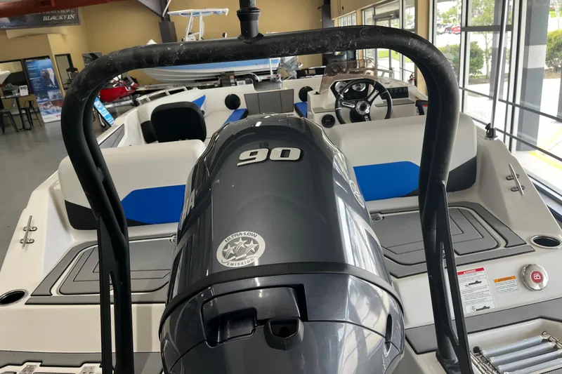 Slide: The Image of 2026 Starcraft SV 16 OB boat interior with Yamaha 90 engine in showroom. - 8
