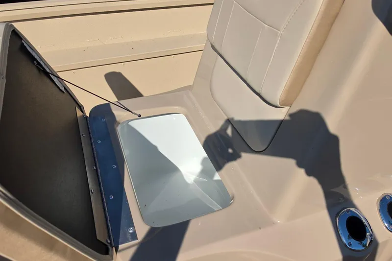 Slide: The Image of Interior of 2026 G3 Bay 17 boat with storage compartments and seating. - 18