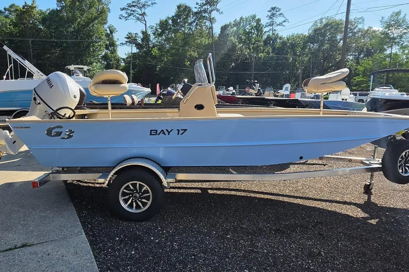 Slide: The Image of 2026 G3 Bay 17 boat deck with storage compartments and sleek design. - 23
