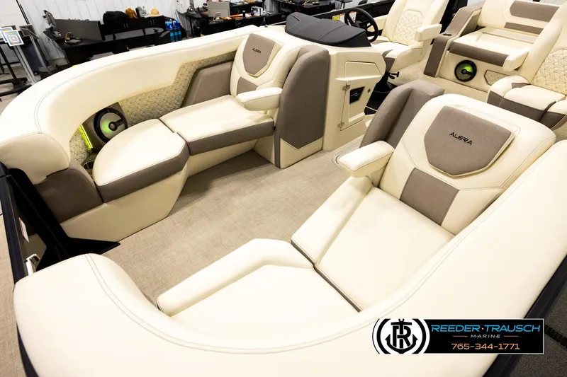 Slide: The Image of Luxurious interior of 2026 Alera M23L boat with beige and brown seating. - 10