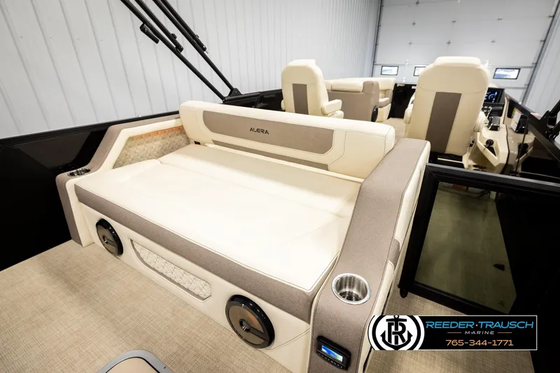 Slide: The Image of 2026 Alera M23L boat interior with plush seating and modern design. - 25