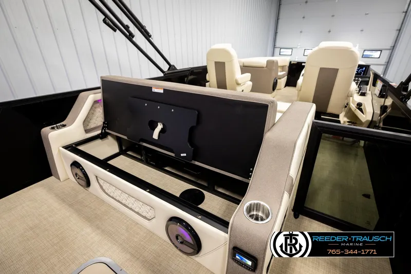 Slide: The Image of Interior of 2026 Alera M23L boat with seating and entertainment setup. - 27