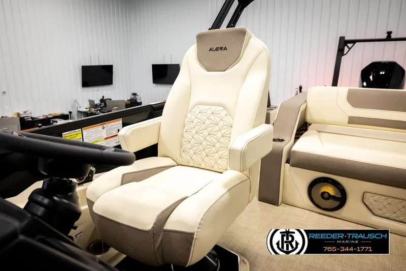 Slide: The Image of Luxury Alera M23L 2026 boat seat in beige and gray, featuring diamond stitching. - 28