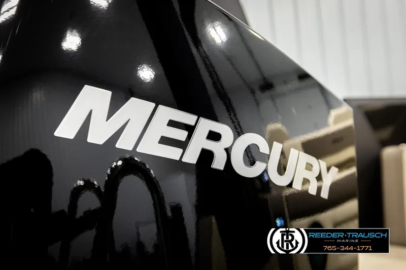 Slide: The Image of Mercury logo on sleek black surface, Alera M23L 2026 model, Reeder-Trausch Marine branding. - 55