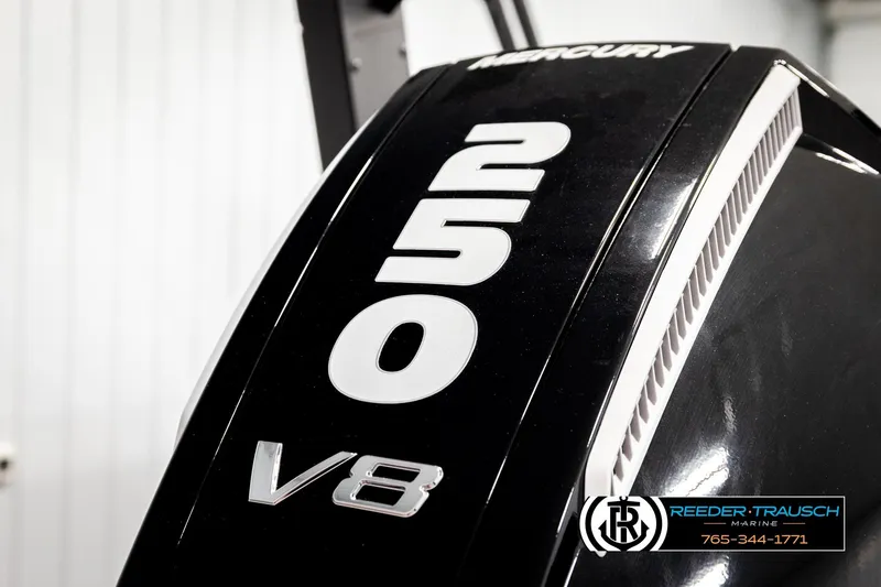 Slide: The Image of Mercury 250 V8 engine close-up, featuring sleek black design and branding. - 56