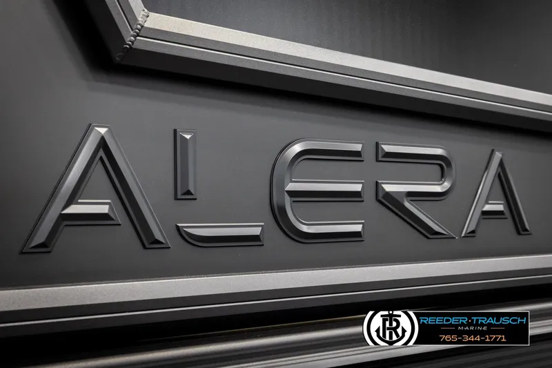 Slide: The Image of Close-up of Alera M23L 2026 logo on a sleek black surface. - 59