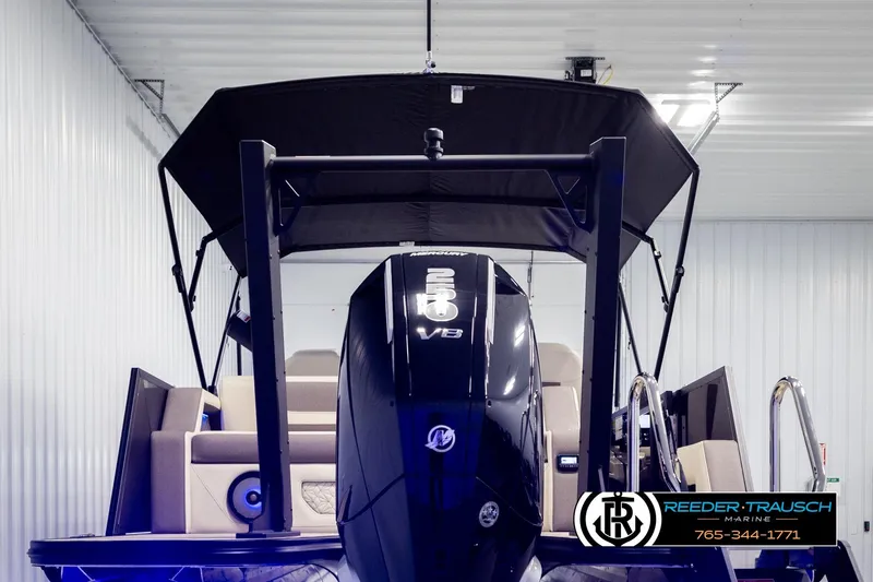 Slide: The Image of 2026 Alera M23L boat with powerful V8 engine in a showroom. - 7