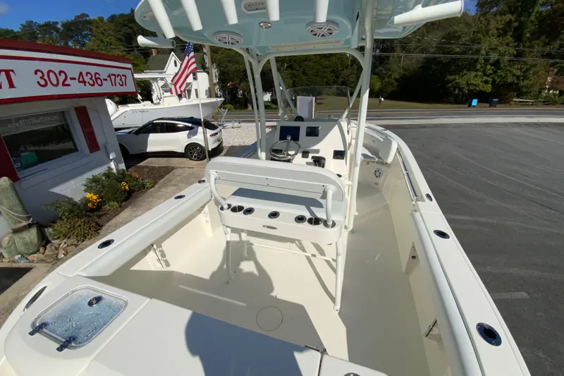 Slide: The Image of 2026 Cobia 220 Center Console boat with spacious deck and modern features. - 10
