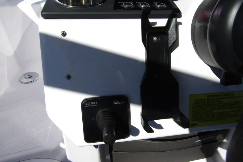 Slide: The Image of Control panel of 2024 Axopar 25 Cross Top boat with thruster control. - 15
